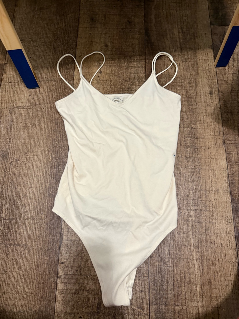 Cream Spaghetti Strap One-Piece Bodysuit
